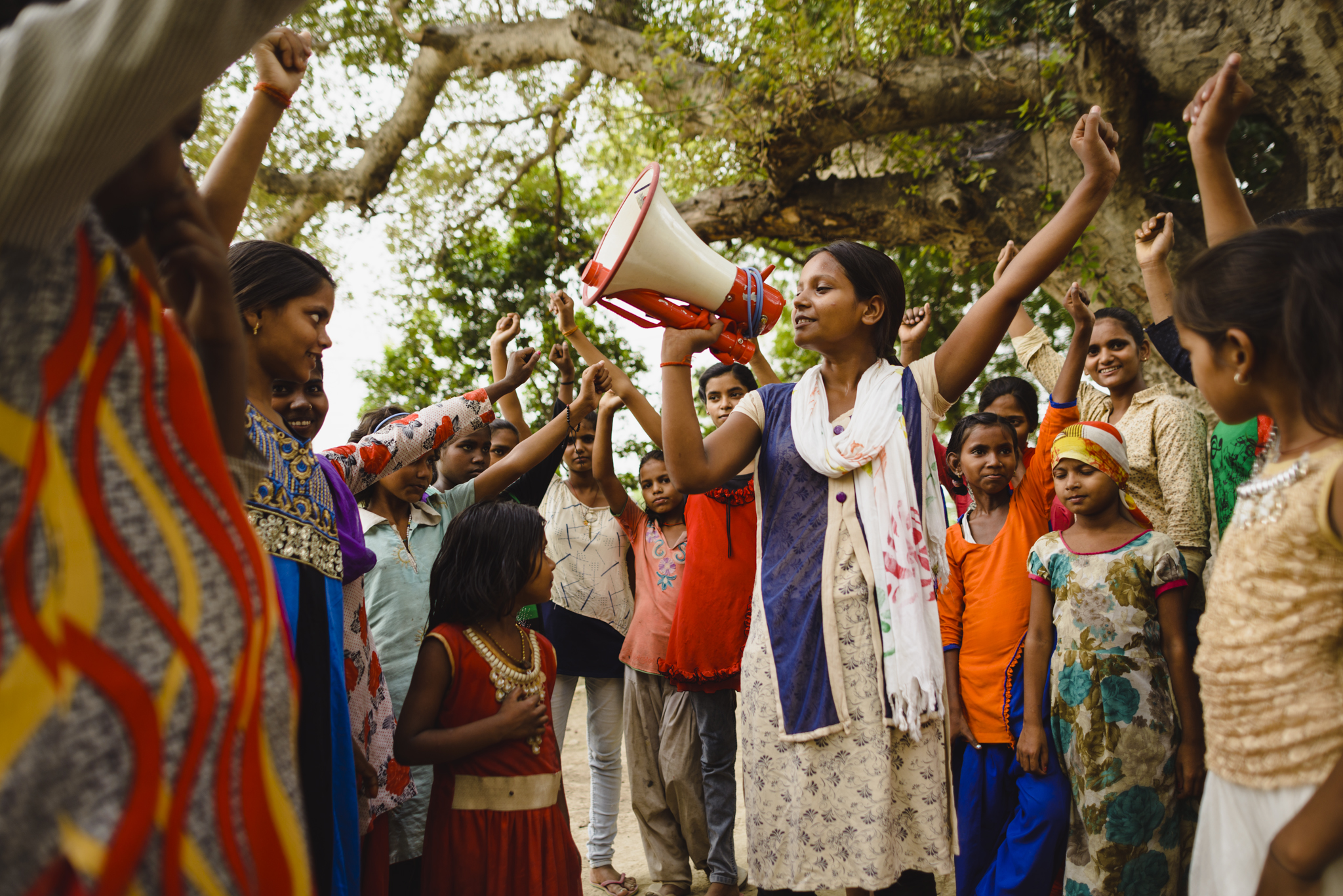 Woman with a megaphone addressing a crowd